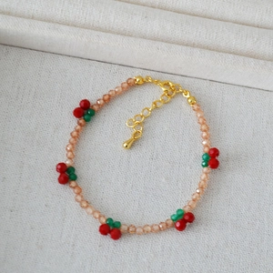 Handmade cherry beaded bracelet with champagne zircon crystals and adjustable gold chain