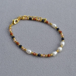 Baroque freshwater pearl bracelet with blue and gold sand stone beads and lobster clasp