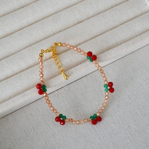Handmade beaded bracelet with red cherries and peach crystal zircons for summer style
