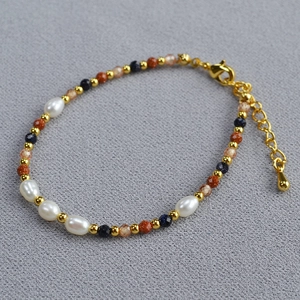 Detailed close-up of Baroque pearl bracelet with blue sandstone and adjustable clasp