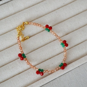 Handmade beaded cherry bracelet with champagne crystals and gold lobster clasp