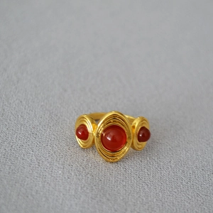 Vintage gold plated brass ring with three red carnelian agate stones and spiral texture