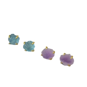 Gold-plated brass stud earrings with raw aquamarine and amethyst in four-prong settings