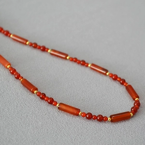 Retro red agate necklace with polished tube beads and gold accents for women