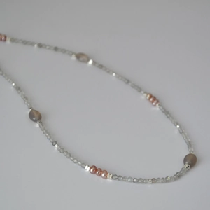 Minimalist vintage necklace featuring labradorite stones and soft pink freshwater pearls