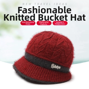 Detail of winter knit cloche hat showing thick textured wool blend and silver accents