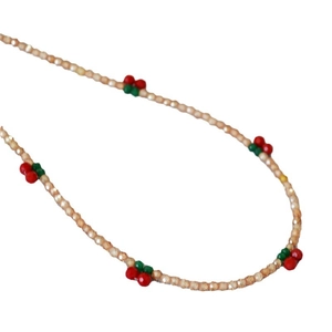 Elegant champagne beaded necklace with cute red cherry accents for a sweet feminine style