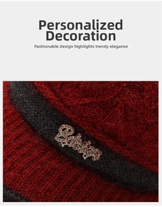 Macro detail of wine red knitted wool hat featuring sparkling rhinestones and metal accents