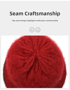 Detail of red knitted winter hat showing meticulous top stitching and wool craftsmanship