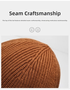 Macro shot of brown knit beanie showing detailed stitching and thick wool texture