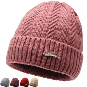 Close-up of pink knit hat with pearl leaf brooch and color options for elderly women