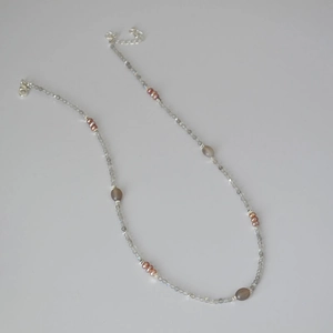 Detail view of labradorite beads and freshwater pearls with adjustable silver lobster clasp
