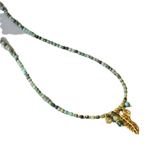 French vintage style necklace with turquoise beads and golden hollow leaf pendant
