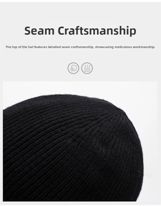 Detailed view of the vertical ribbed texture and precise stitching on black knit beanie