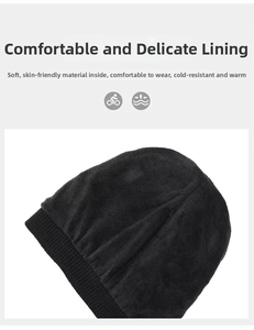 Detail showing soft fleece lining inside the black knitted winter beanie for warmth