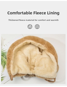 Close-up of thick plush beige lining inside a brown winter trapper hat for warmth