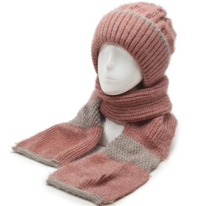 Detailed close-up showing the fuzzy texture of the pink and grey knitted hat scarf set