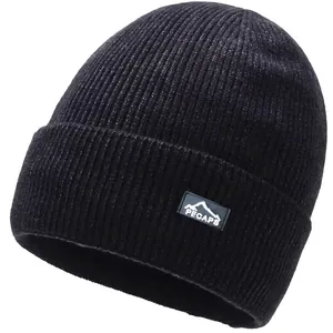 Winter heather grey knit beanie with warm fleece lining and mountain logo patch