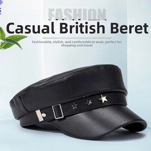 Detail of black PU leather beret featuring silver star studs and decorative metal buckle