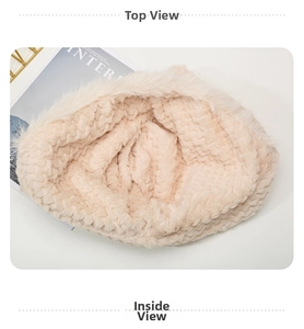 Detail of the thick plush lining with wavy texture on the beige winter bear hat