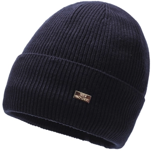 Detail view of Serflow Kids navy blue ribbed knit beanie with cuffed edge and logo tag