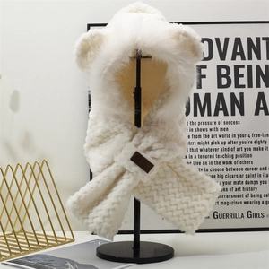 White faux fur hooded scarf with bear ears and cross-over design for winter warmth
