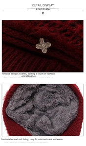 Detail of winter knit hat featuring warm gray fleece lining and wine red plush texture