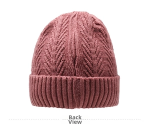Detailed back view of winter knit beanie with thick rose pink cable pattern
