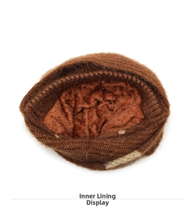 Detailed view of the thick brown knit winter hat showing the soft fleece lining interior