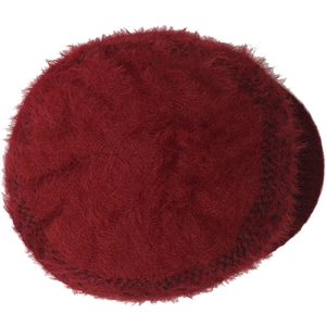 Detailed view of the soft faux fur texture on a warm dark red winter knitted hat