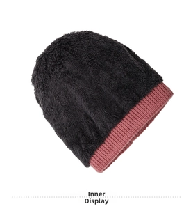 Detailed interior view of winter knit hat showing thick thermal fleece lining
