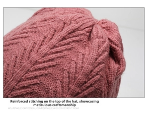 Close-up of reinforced top stitching on pink purple knitted hat showing fine craftsmanship