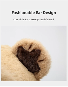 Detailed close-up of plush faux fur animal ear design featuring beige and brown patchwork