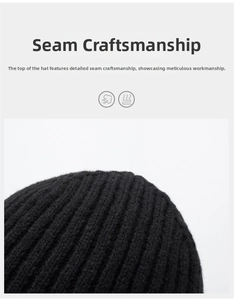 Detailed close-up showing the precise stitching craftsmanship on top of a black knit beanie
