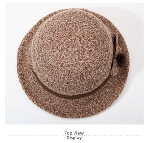 Coffee brown faux lamb wool bucket hat featuring a plush bow and textured curly fleece