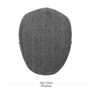 Top view of classic charcoal grey herringbone newsboy cap showing detailed panel construction