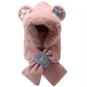 Detailed view of pink plush teddy bear hat with star patches and secure blue loop