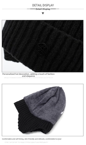 Detail of black knit beanie with warm gray fleece lining and embossed RZG logo patch