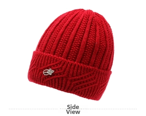 Detail of red knit hat showing thick rib texture and silver rhinestone flower ornament