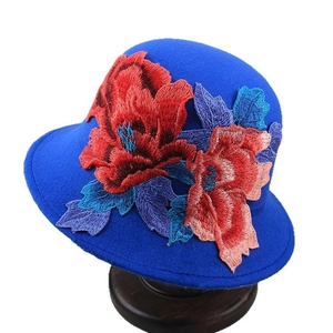 Royal blue wool cloche hat for women featuring intricate floral embroidery and ethnic style