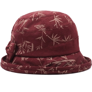 Women's floral bucket hat with bow detail and rolled brim for sun protection
