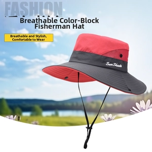 Detail of red and grey outdoor sun hat featuring mesh vents and adjustable chin strap