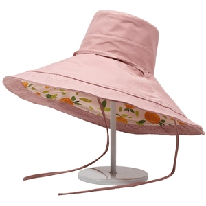 Pink wide brim sun hat for women with orange print lining and adjustable chin strap