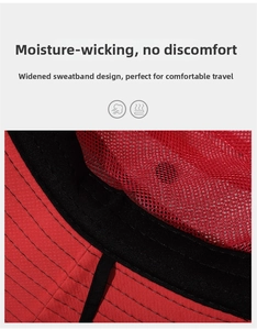 Close-up of wide black sweatband and breathable red mesh lining on a sun hat