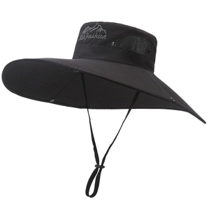 Macro detail of black outdoor sun hat with wide brim and breathable mesh vents