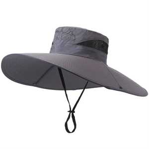 Detail of dark grey sun hat with breathable mesh and mountain embroidery logo