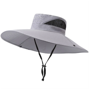 Detail of grey outdoor sun hat with mountain embroidery and mesh ventilation panels