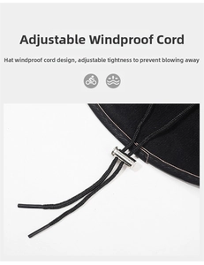 Detail of adjustable windproof chin strap with silver spring toggle on black cowboy hat