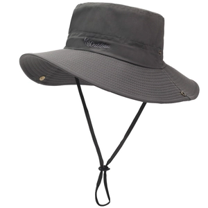 Detail of dark grey sun hat featuring Outdoors embroidery and adjustable windproof rope