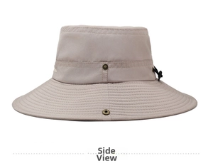 Close-up of beige quick-dry sun hat showing side ventilation eyelets and toggle cord